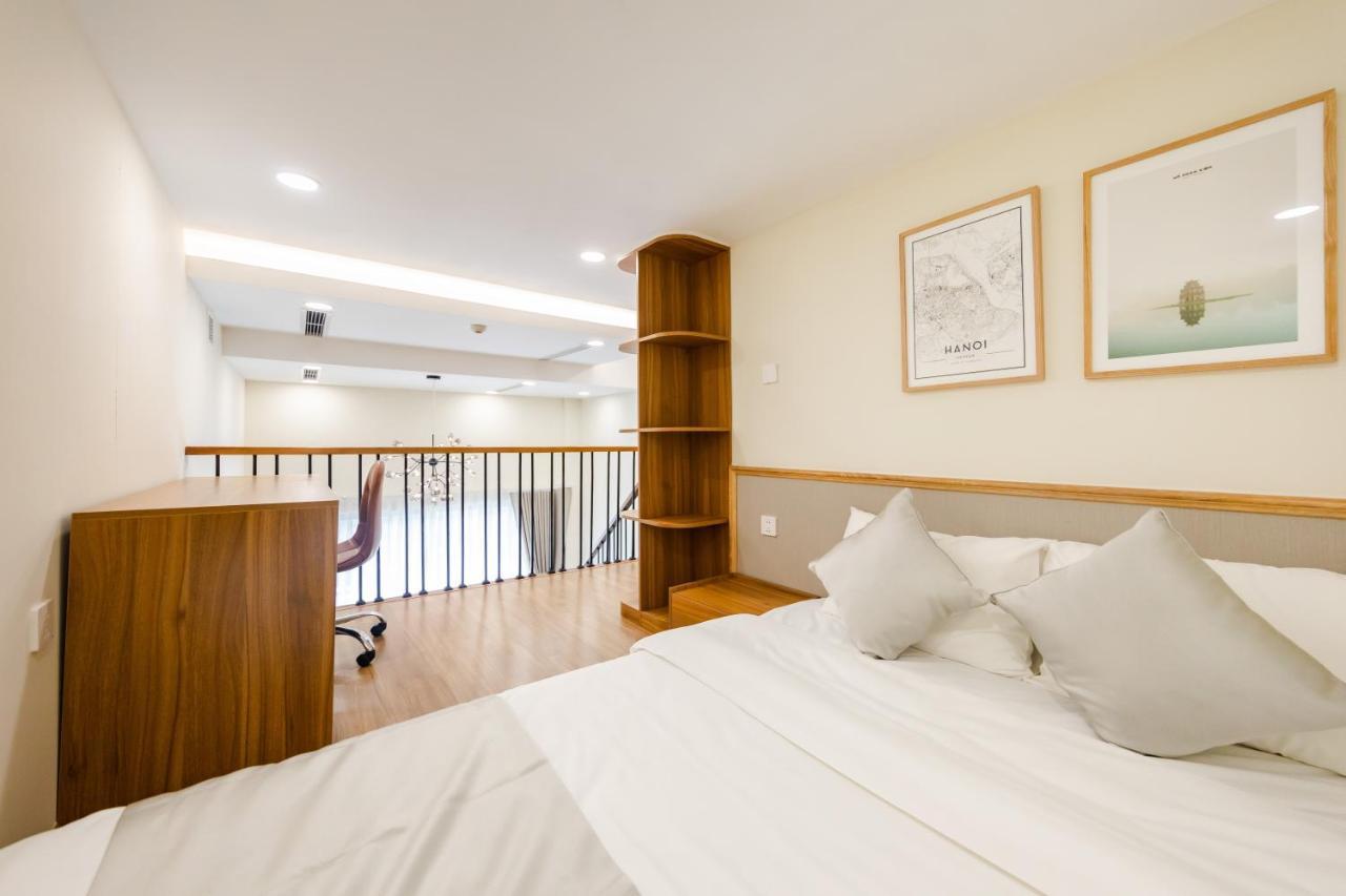 Five Star Westlake 1St-4Th Floors Hotel & Serviced Apartment Ханой Екстер'єр фото A bedroom in a serviced apartment in Singapore